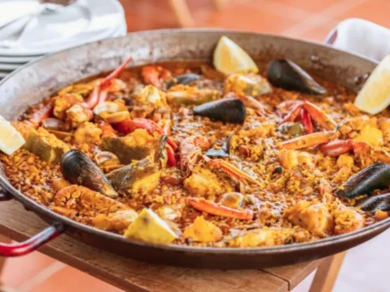 Traditional seafood paella on the terrace