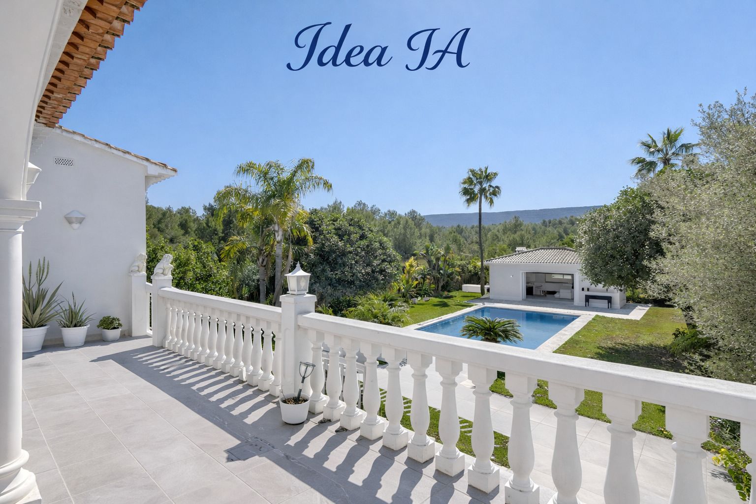 Elevated terrace featuring a classic white balustrade, overlooking the large swimming pool, landscaped gardens, and a separate poolside pavilion amidst lush greenery.