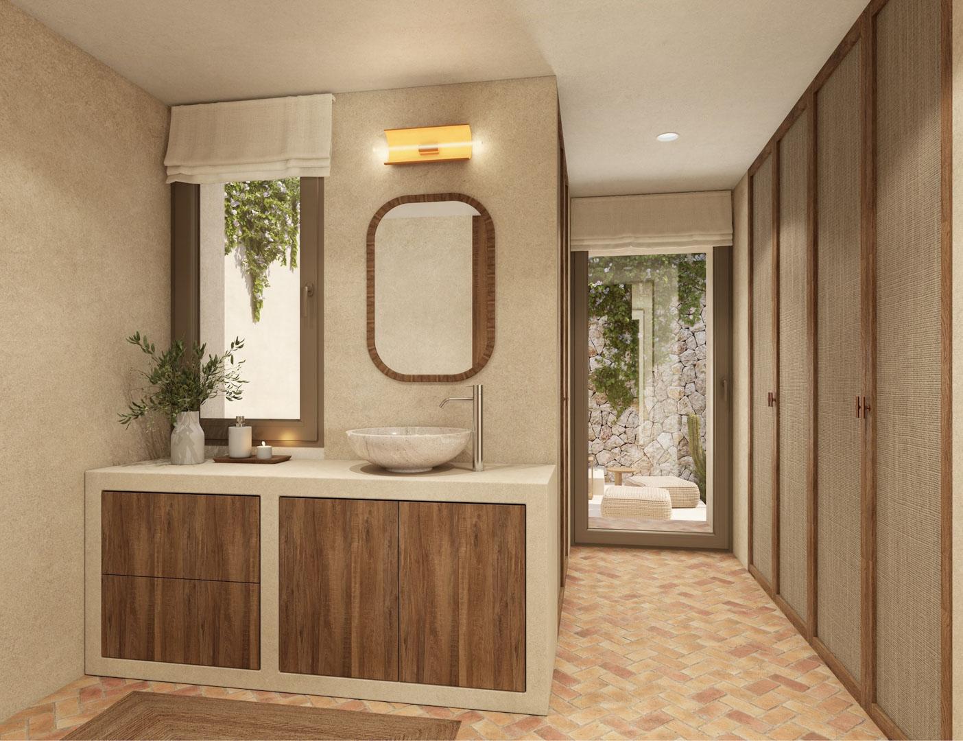 Bathroom featuring a stone vessel sink, wooden cabinetry, and terracotta herringbone flooring. Includes integrated wardrobes with textured panels and access to a private outdoor patio.