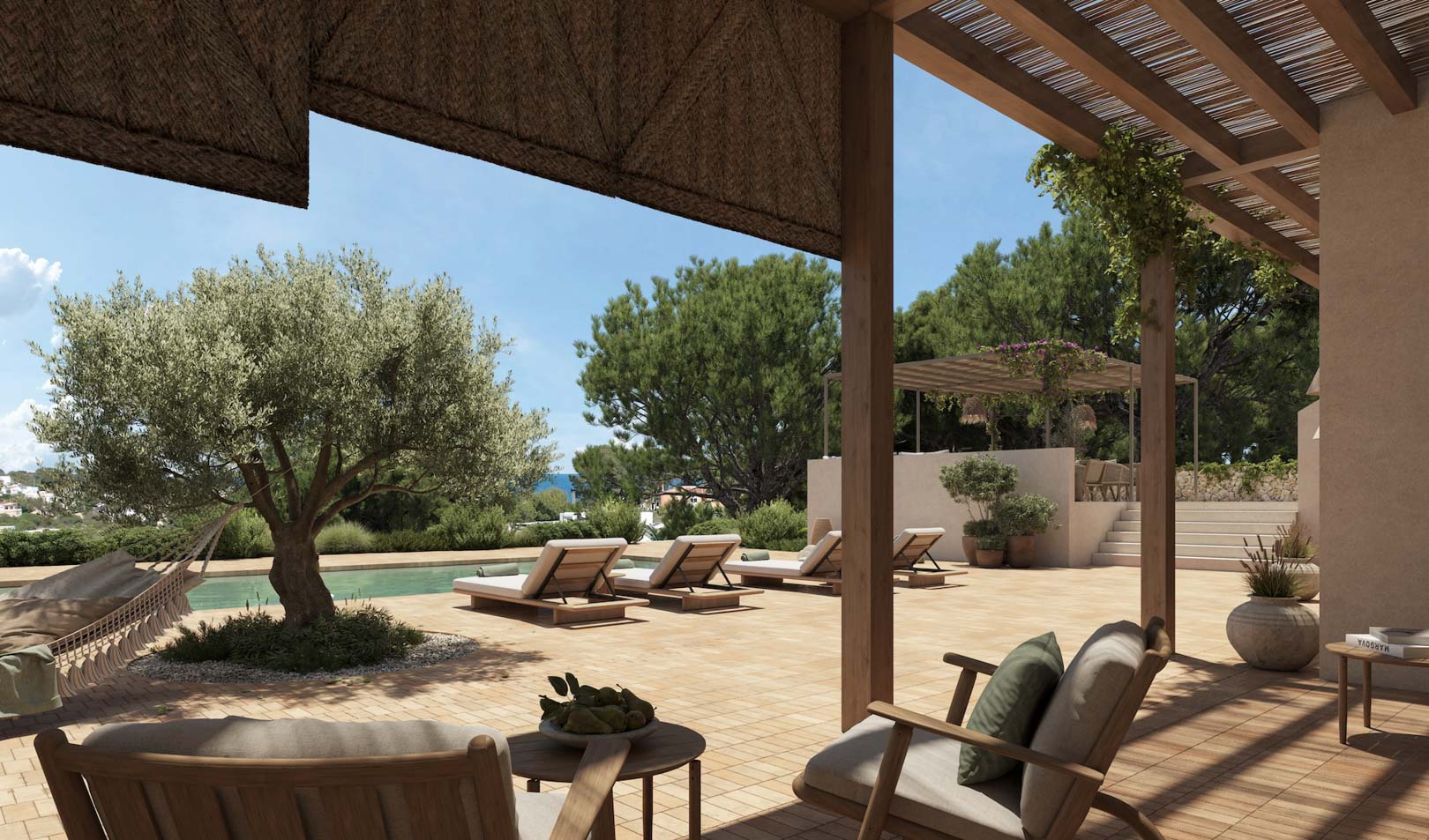 Main terrace featuring a wooden pergola with reed shading, a poolside solarium with sun loungers, and a central olive tree overlooking the garden and sea.