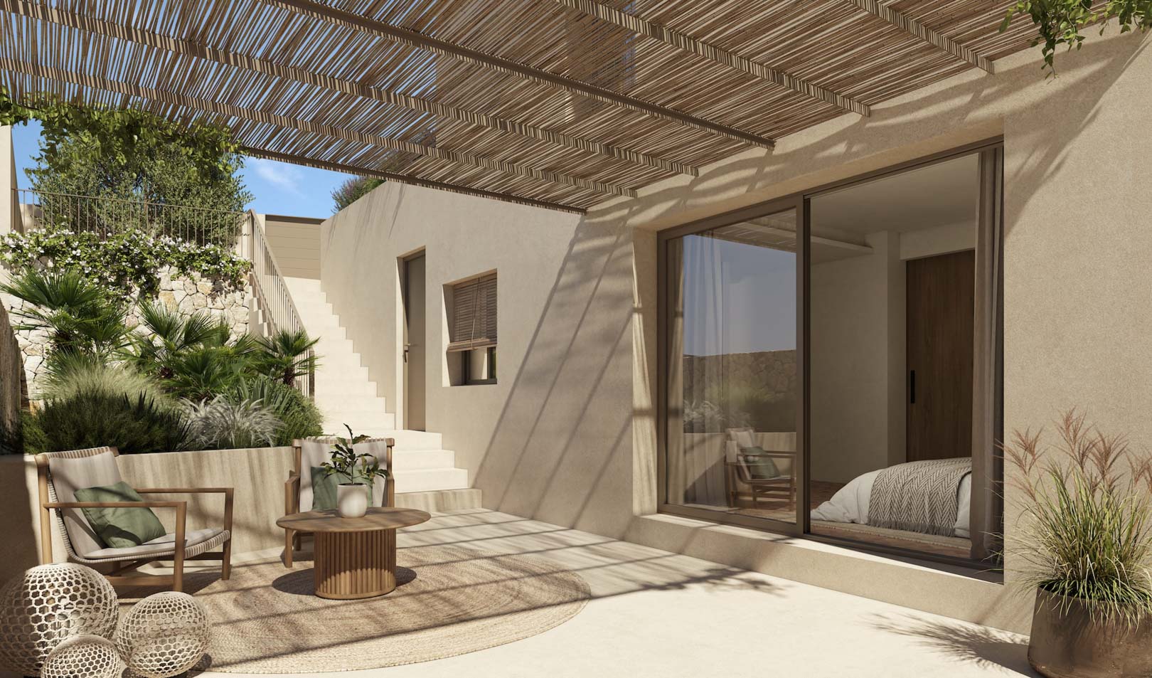 Outdoor terrace featuring a natural reed pergola, wooden lounge furniture, and direct access to a bedroom through large sliding glass doors.