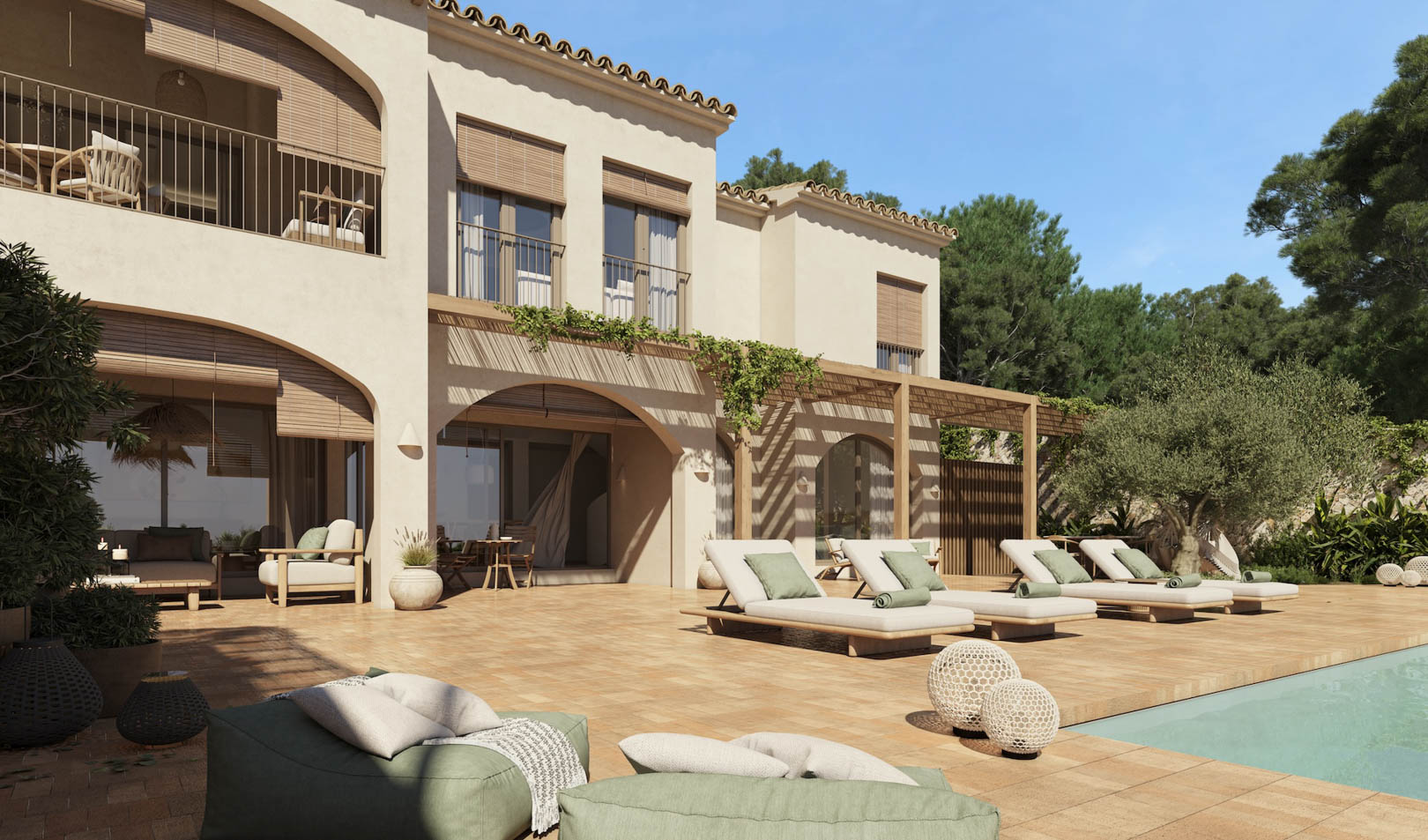 Villa exterior featuring a terracotta terrace, swimming pool, and wooden pergolas. The facade shows traditional arches, modern loungers, and an olive tree integrated into the landscape.