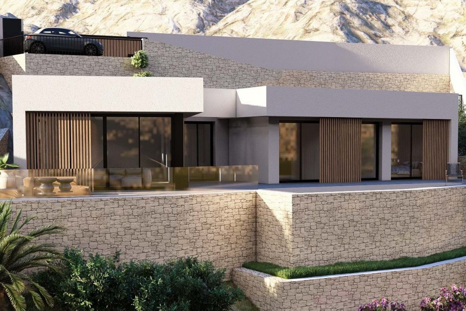 Modern villa exterior featuring natural stone retaining walls, floor-to-ceiling glass doors with wooden slats, and a glass-enclosed terrace set against a mountain backdrop.