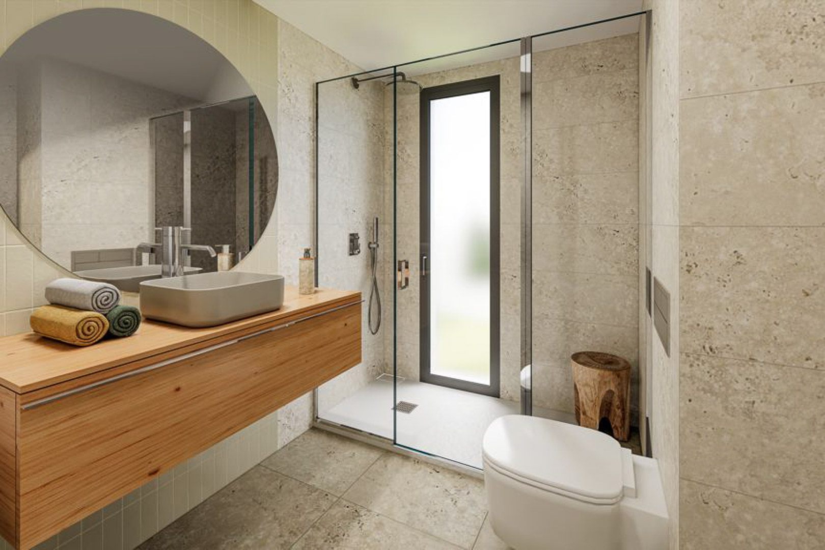 Modern bathroom featuring a floating wooden vanity, vessel sink, and large circular mirror. The walk-in shower includes a glass partition and elegant stone-textured wall tiling.