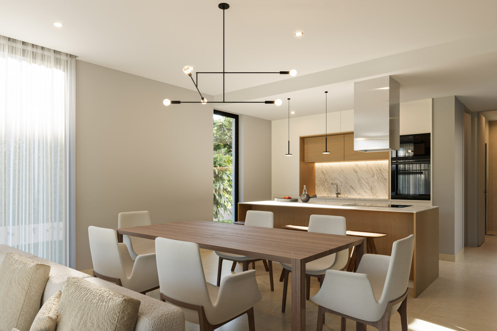 Open-plan dining area and designer kitchen featuring a marble-topped island, wooden cabinetry, and a minimalist black chandelier above the dining table.