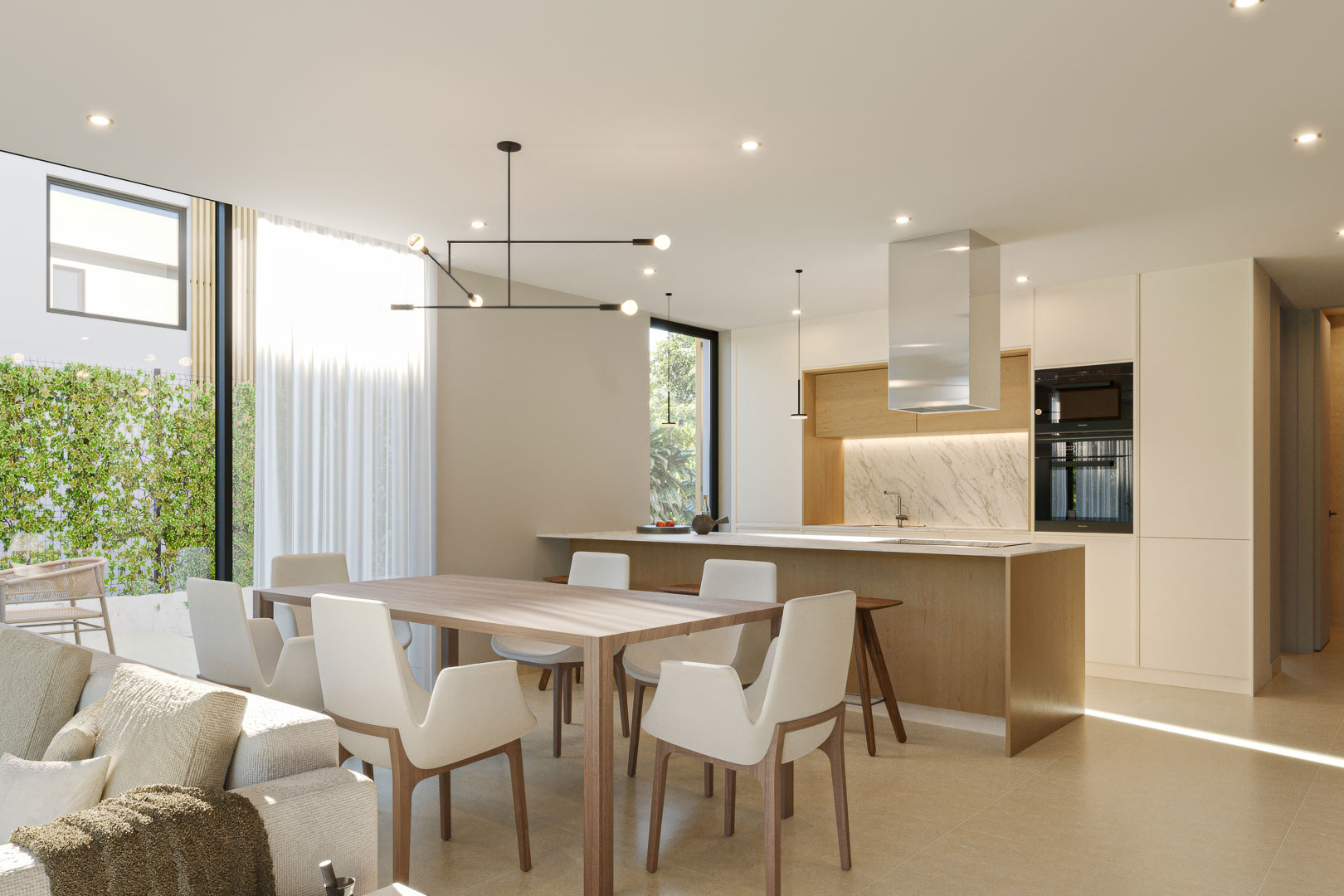 Open-plan living area featuring a modern kitchen with a wooden island, marble backsplash, and a dining set under minimalist designer lighting.