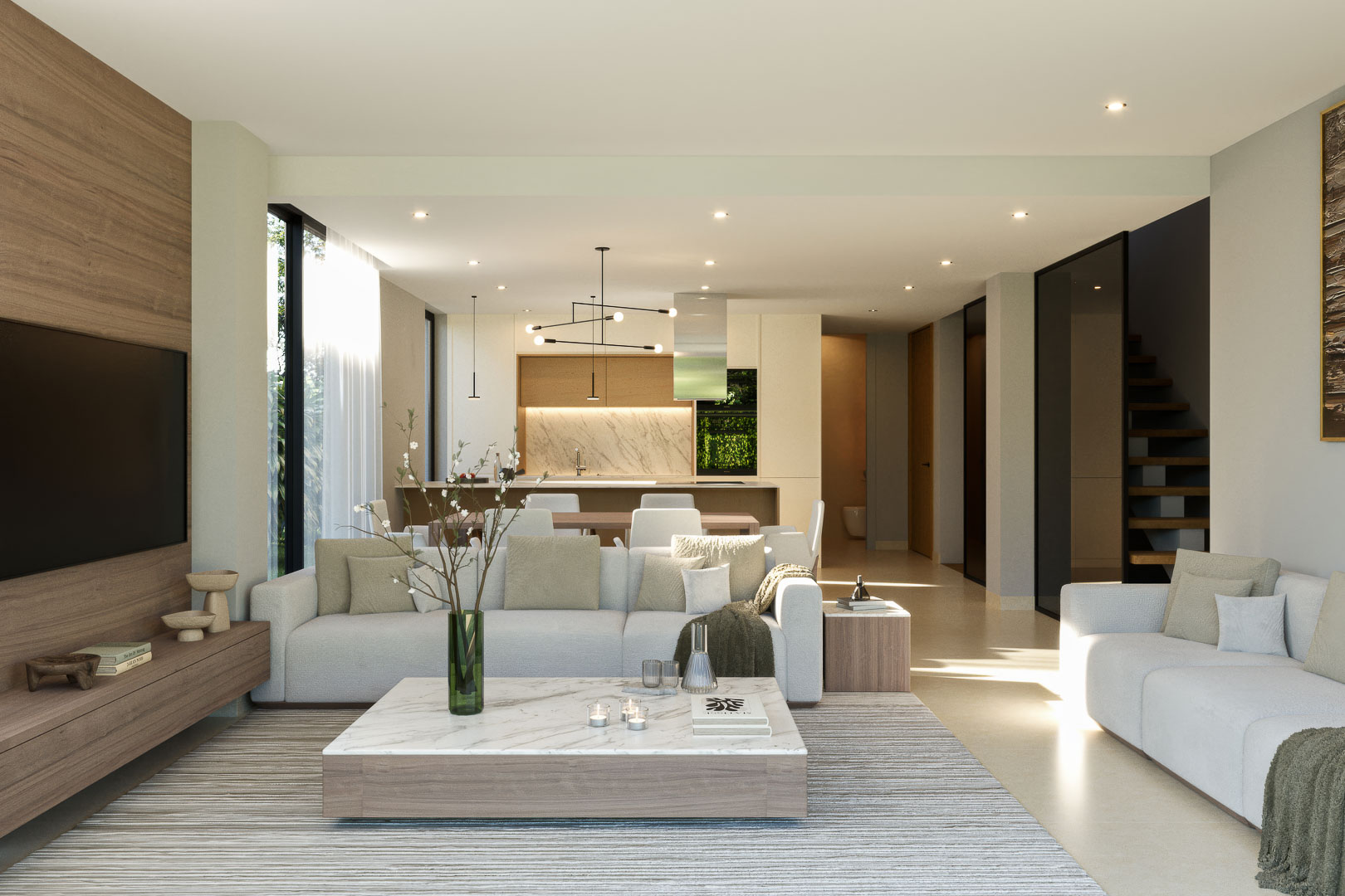Open-plan living area featuring a wooden accent wall, marble coffee table, and a modern kitchen with natural stone finishes and a floating staircase.