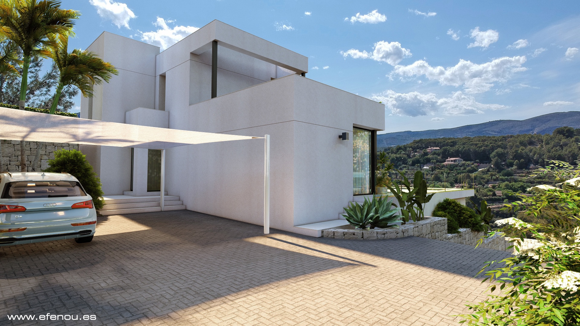 Main entrance featuring a paved driveway with a white shade sail for parking, framed by natural stone walls and views of the surrounding green mountains.