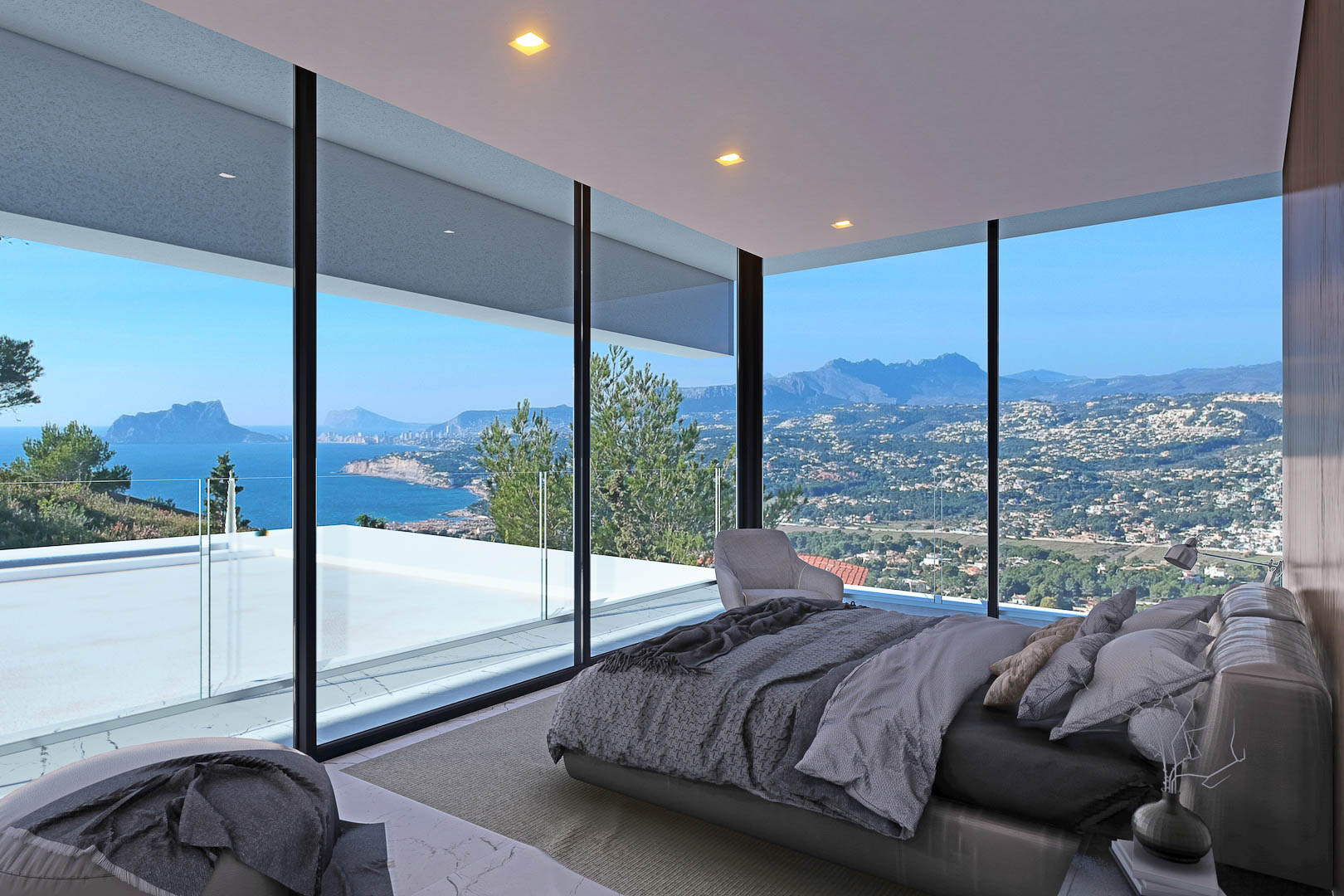 Bedroom with expansive sea and coastal views, featuring floor-to-ceiling windows and natural light.