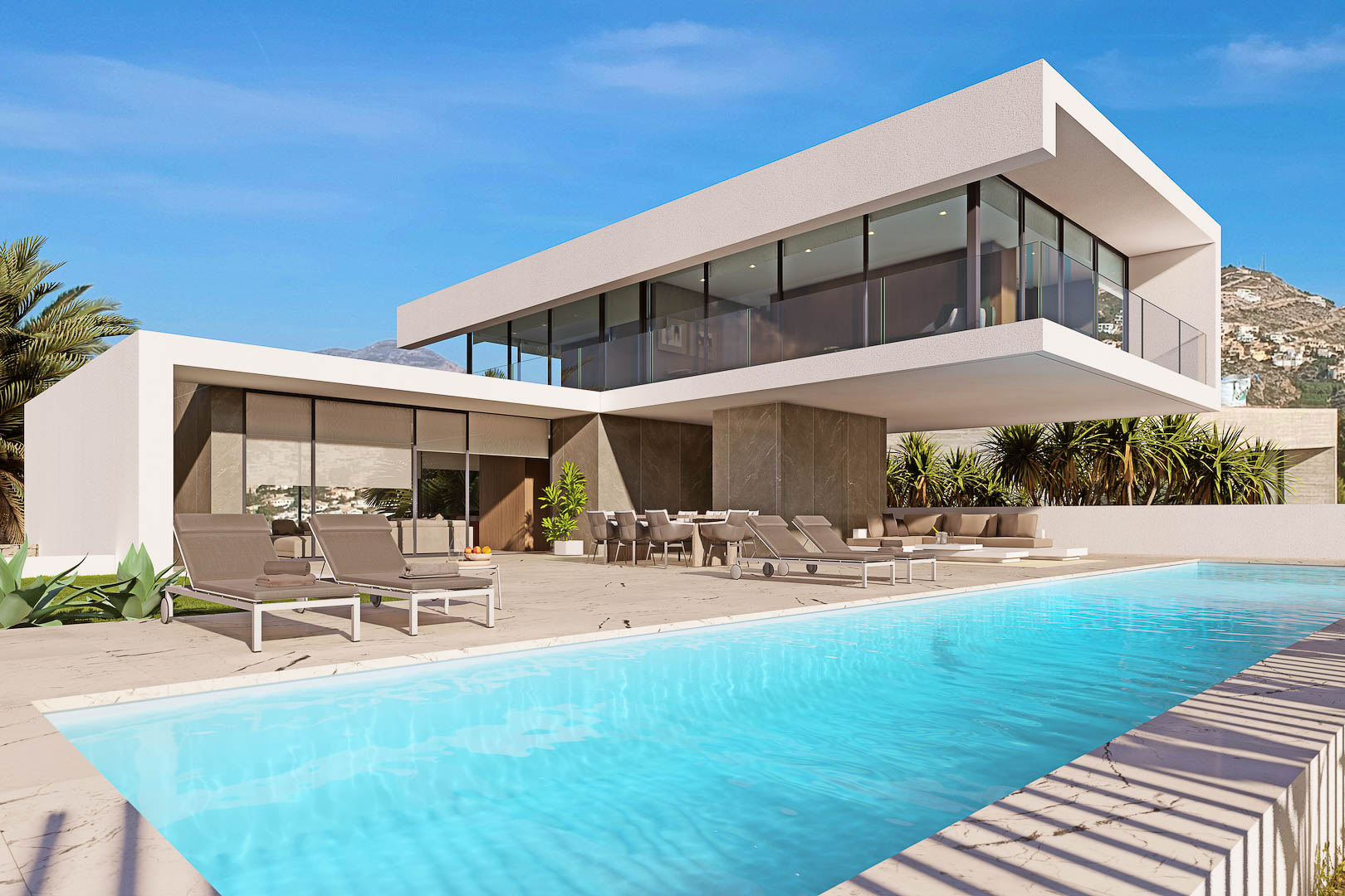 Exterior view of the villa featuring a turquoise pool, terrace with lounge chairs, and outdoor dining area.