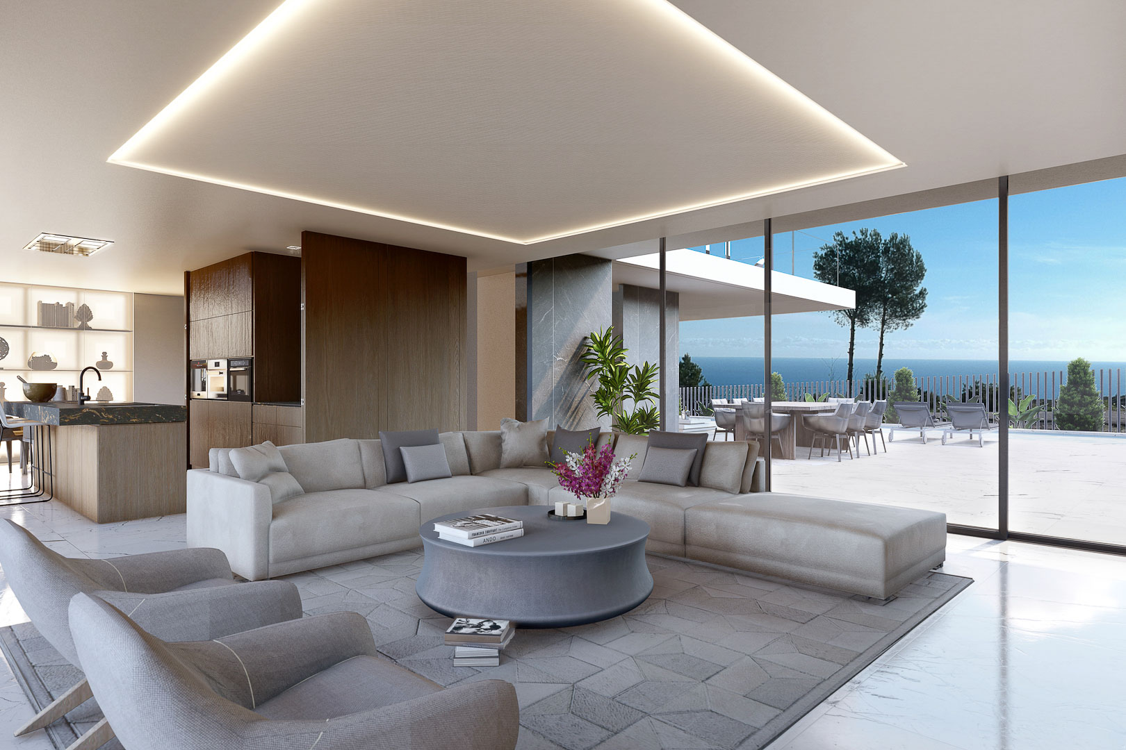 Modern living room with gray modular sofa and sea views, illuminated with indirect light.