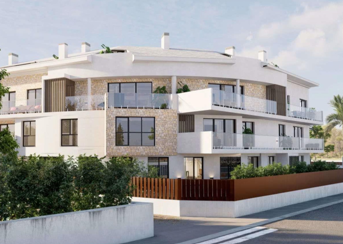 Exterior view of the residential building featuring natural stone cladding, glass-railed terraces, and modern black window frames.