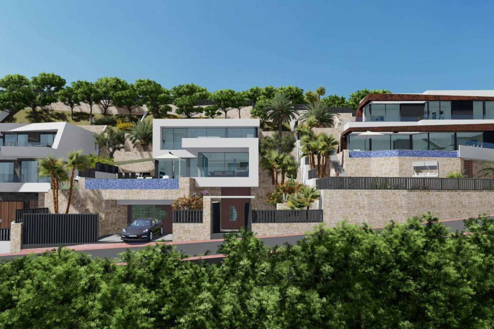 Exterior view of the modern villa featuring cubic architecture, natural stone walls, blue mosaic infinity pools, and landscaped hillside gardens.