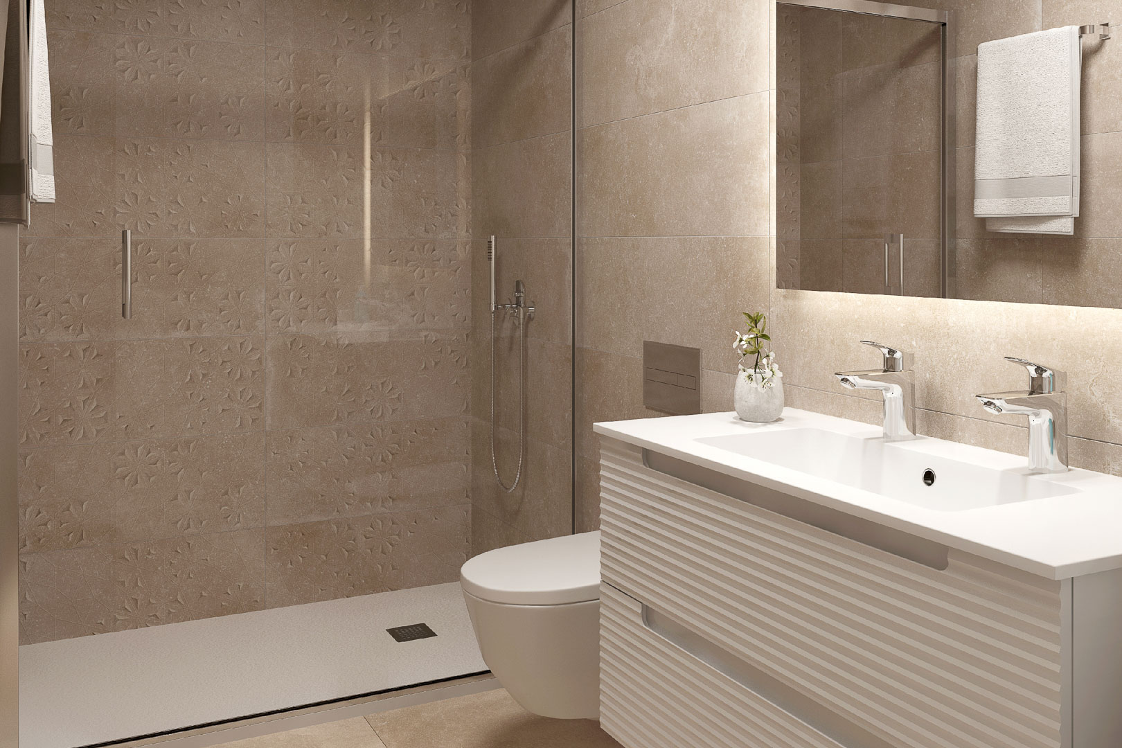 Modern bathroom featuring a walk-in shower with textured floral tiles and a glass partition. A wall-hung vanity with double chrome faucets and integrated mirror lighting.