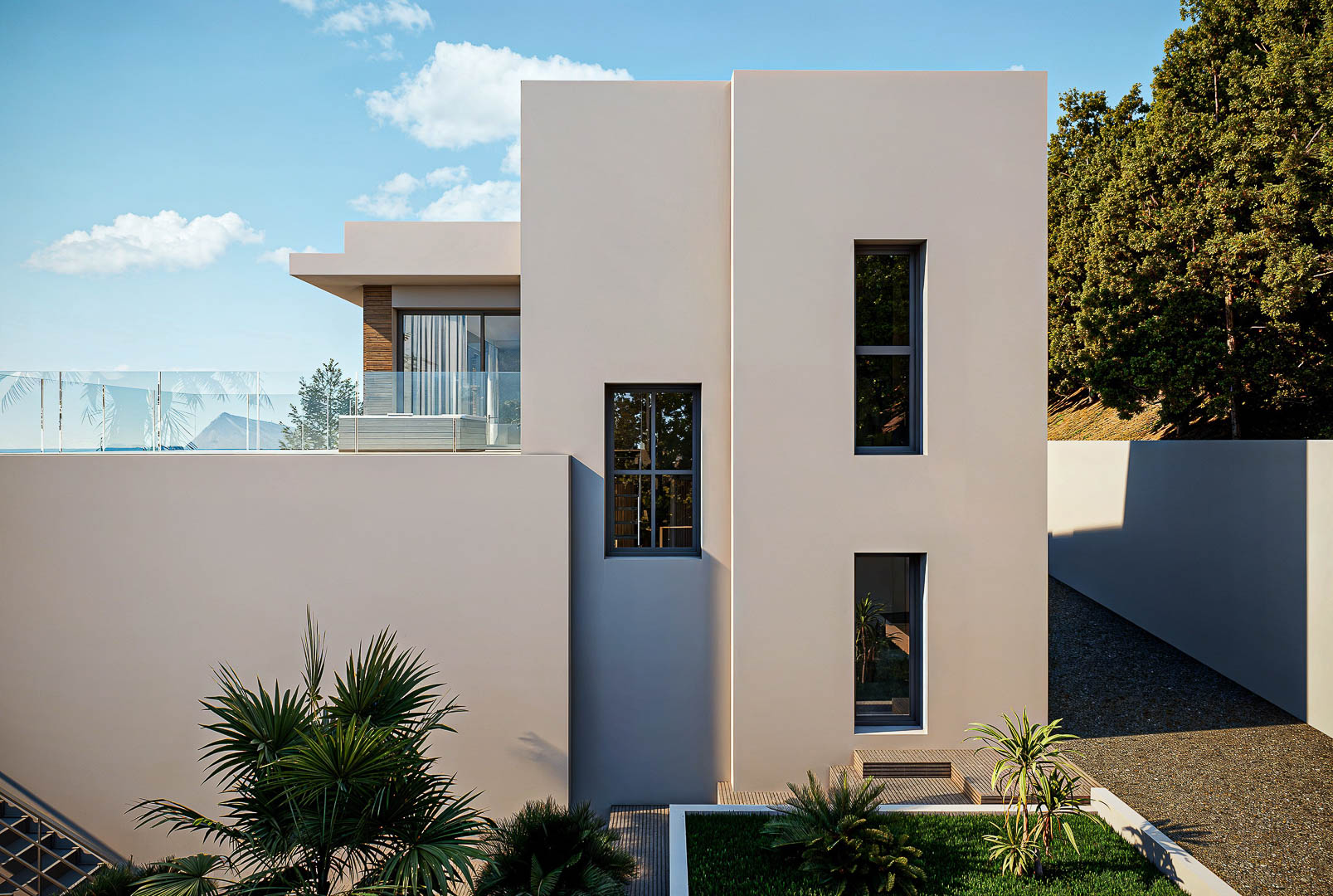 Minimalist facade featuring geometric volumes in neutral tones, vertical windows, and an upper terrace with glass balustrades overlooking the sea.