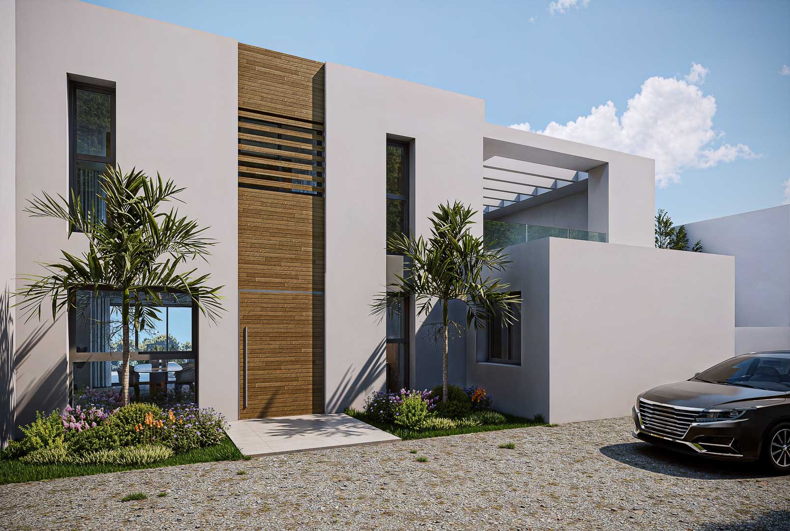 Minimalist main facade featuring a large-format wooden entrance door, vertical windows, and landscaped garden beds with palms along a gravel driveway.