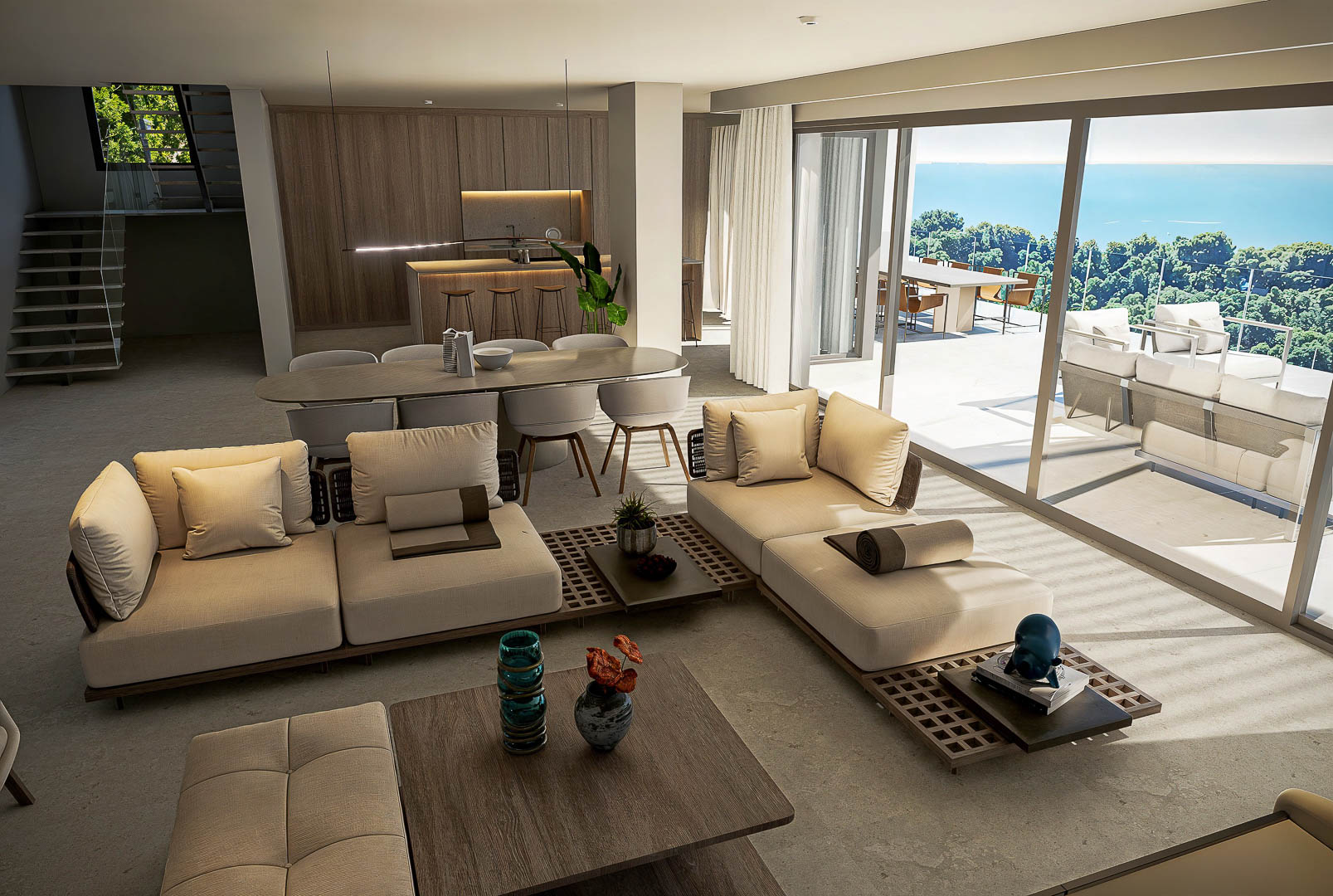 Open-concept living area featuring modular sofas, a dining set, and a wood-paneled kitchen. Floor-to-ceiling glass doors open to a terrace with expansive Mediterranean views.