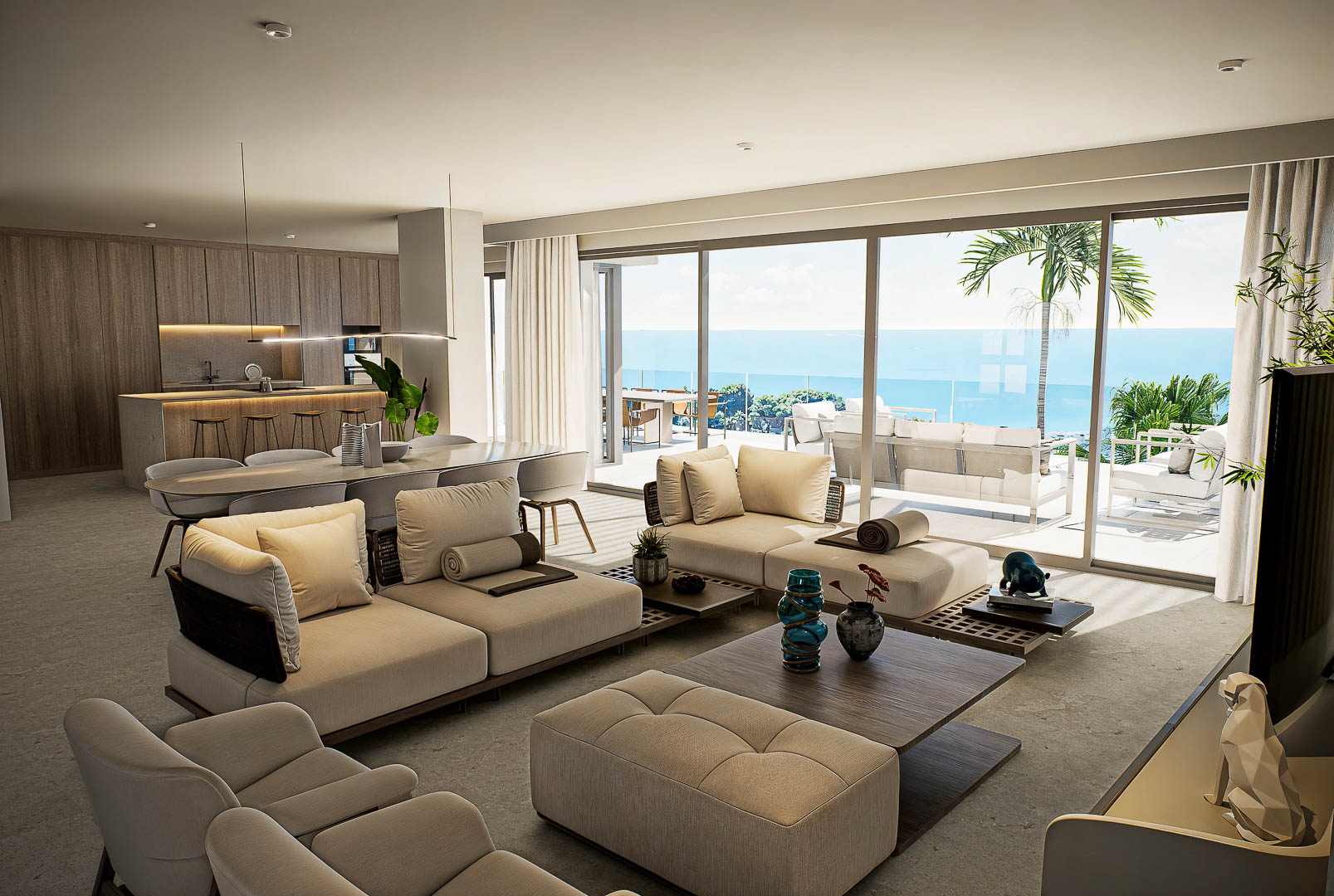 Open-concept living area featuring modular sofas, a wood-paneled kitchen, and floor-to-ceiling glass doors with panoramic Mediterranean views.