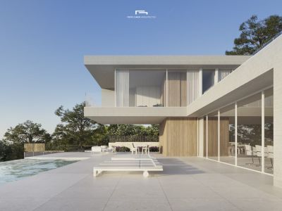 Exterior view of the villa featuring an infinity pool and a sun deck with white sun loungers.