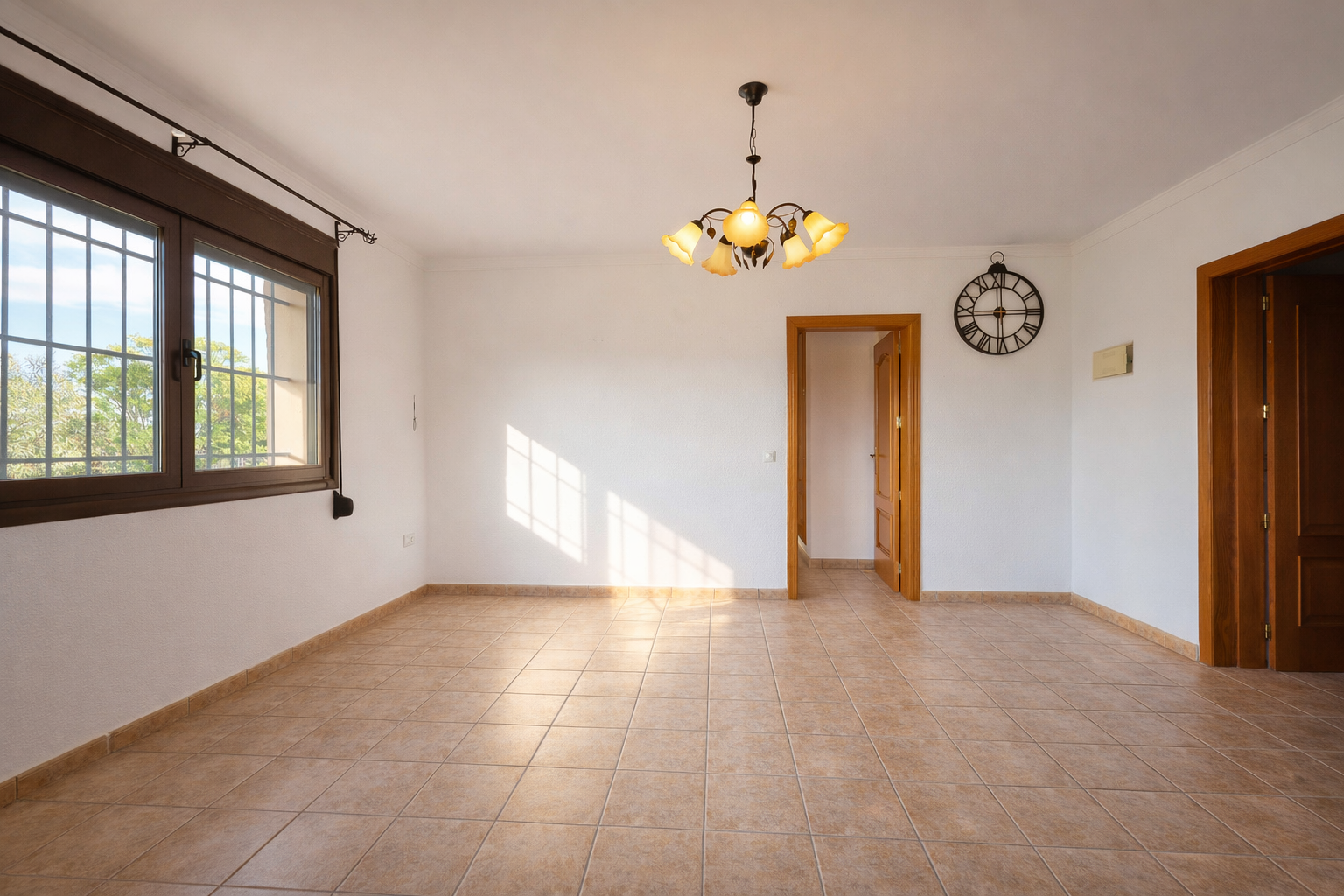 Spacious naya with stone arches and a rustic fireplace, offering panoramic views of the valley and majestic Montgó.