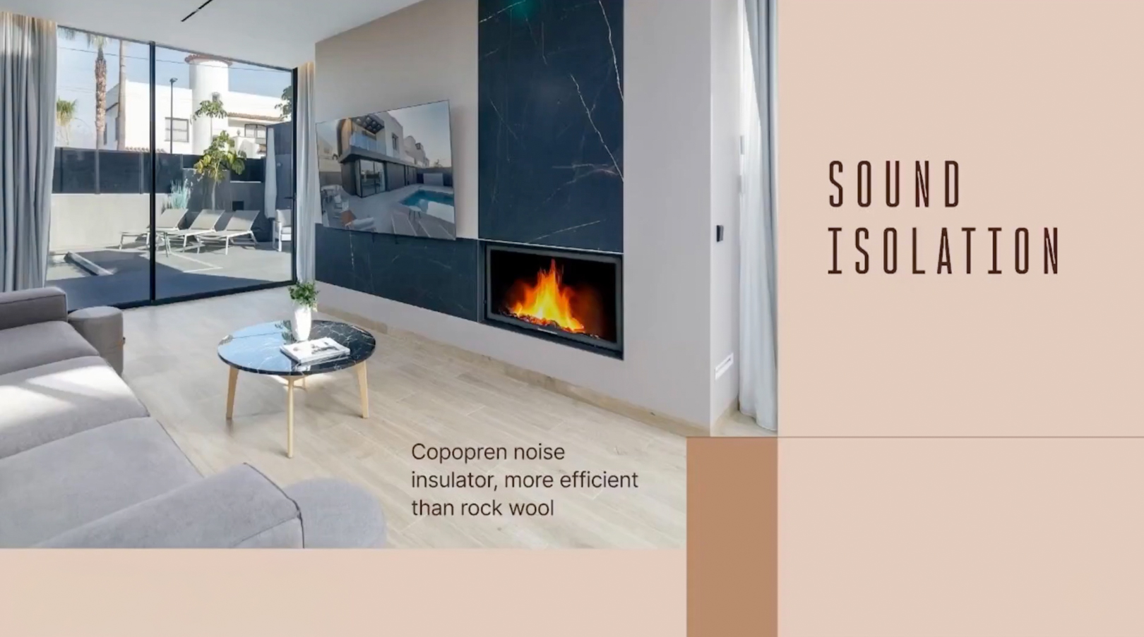 Contemporary living room with a grey sectional sofa, black marble coffee table, and a striking dark marble feature wall with an integrated fireplace and TV, opening to an outdoor terrace.