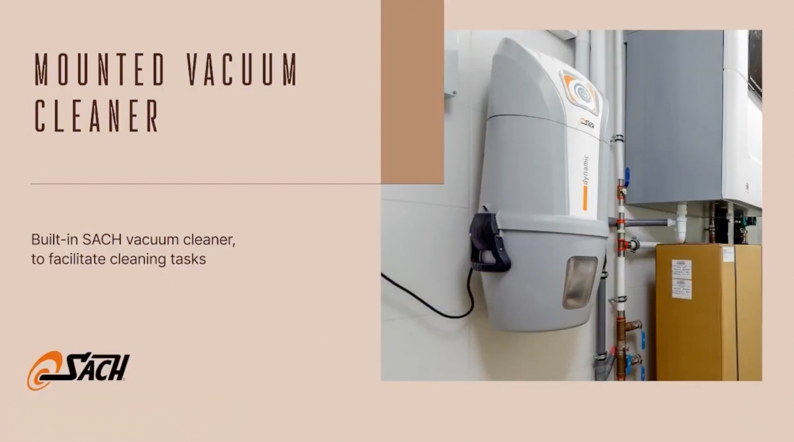 Wall-mounted SACH Dynamic central vacuum system unit, integrated with technical installations for efficient cleaning.