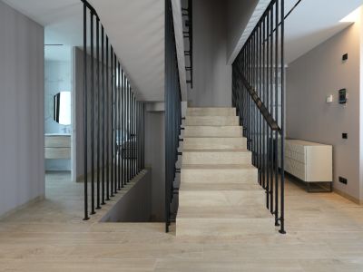 Modern interior with light wood-look staircase featuring sleek black vertical railings. A smart home control panel is visible, leading to a contemporary bathroom with a round mirror.