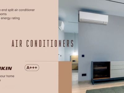 Modern living space featuring a high-efficiency Daikin split air conditioner and a contemporary sideboard with dark wood and ribbed drawers against a light grey wall.