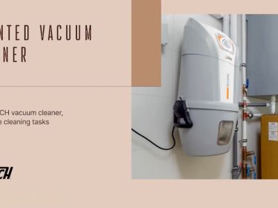 Wall-mounted SACH Dynamic central vacuum system unit, integrated with technical installations for efficient cleaning.