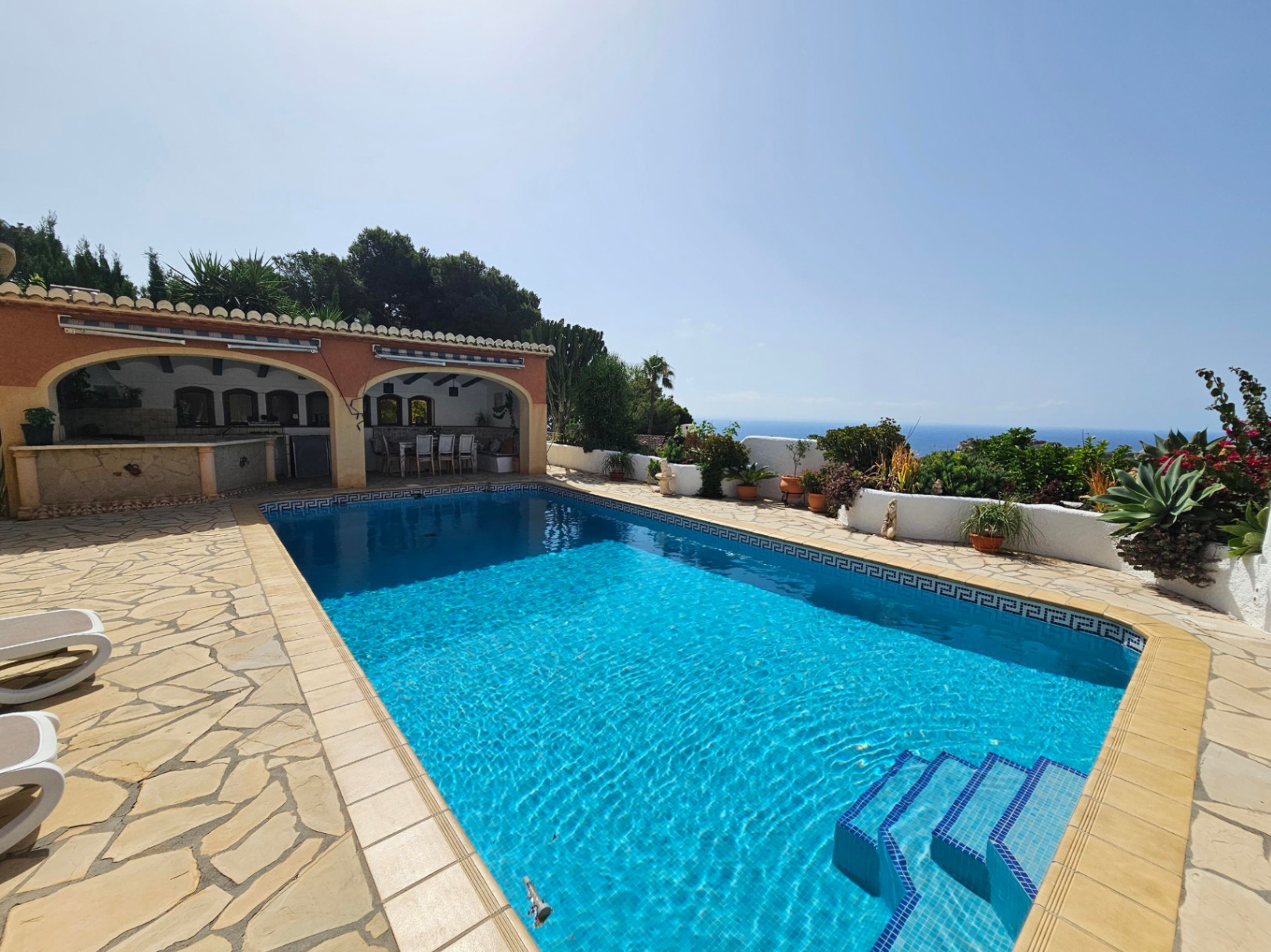 Swimming pool with sea views