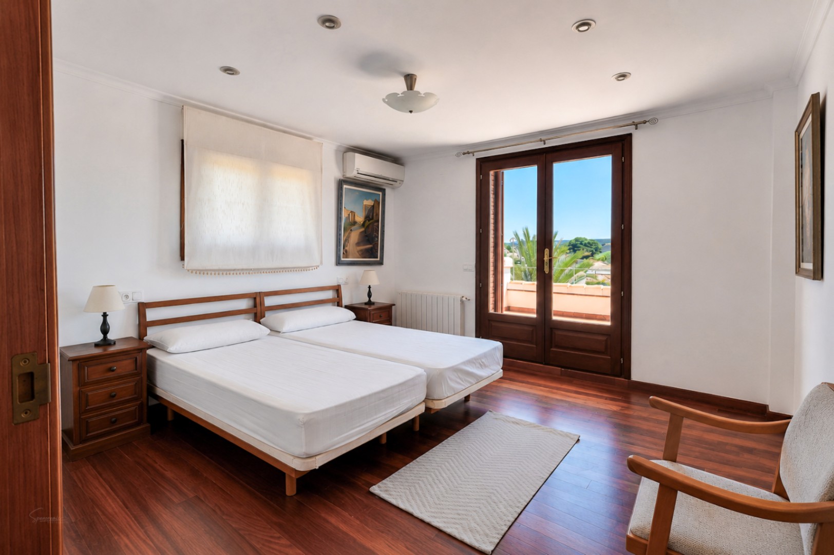 Bedroom with balcony access