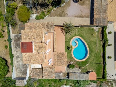Aerial view of house and pool