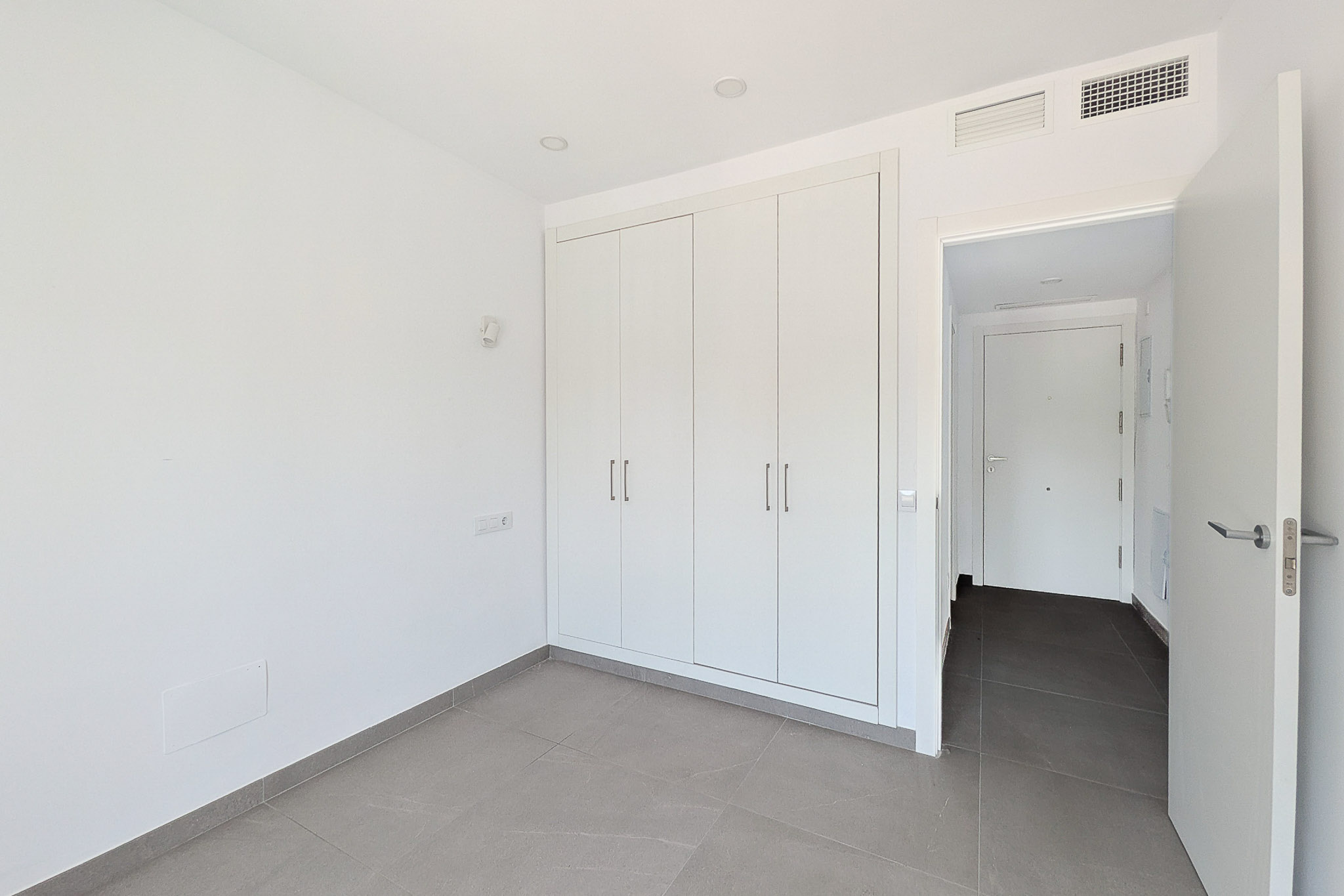 Bedroom with built-in wardrobe