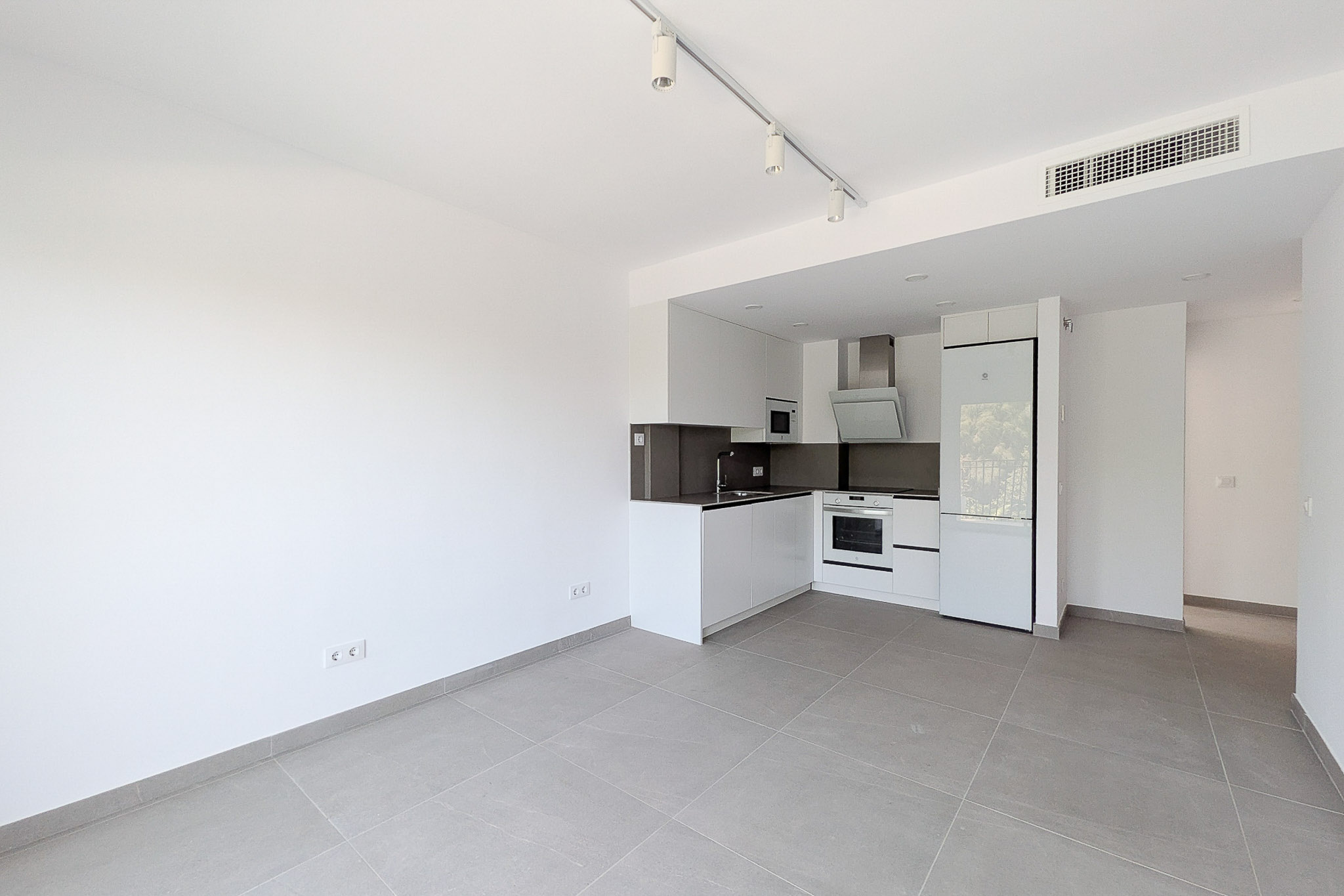 Living room with open kitchen
