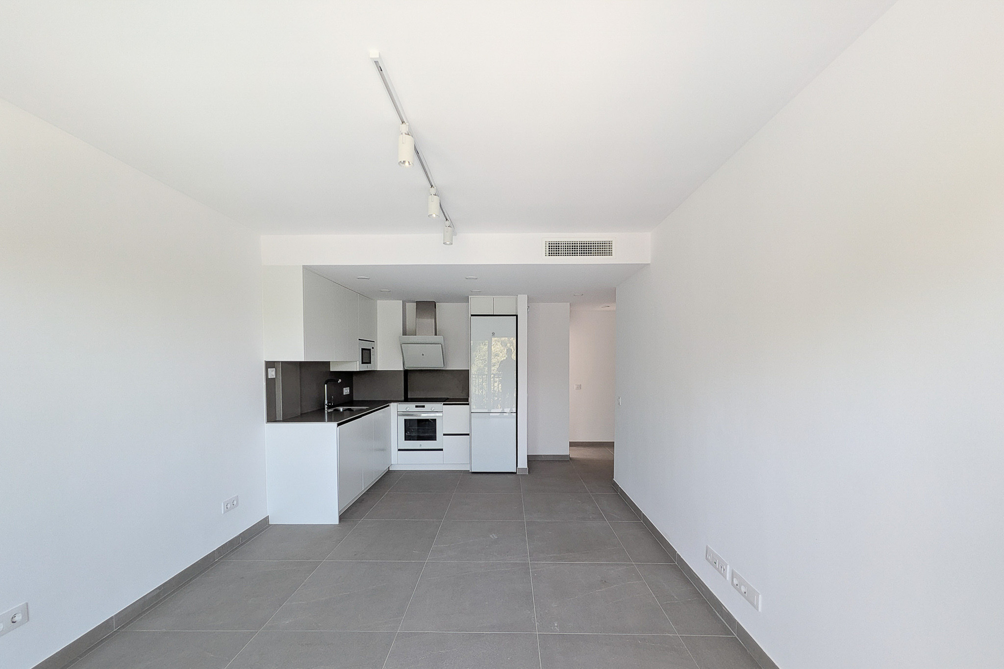 Living room with open kitchen