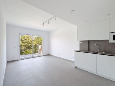 Living room with open kitchen