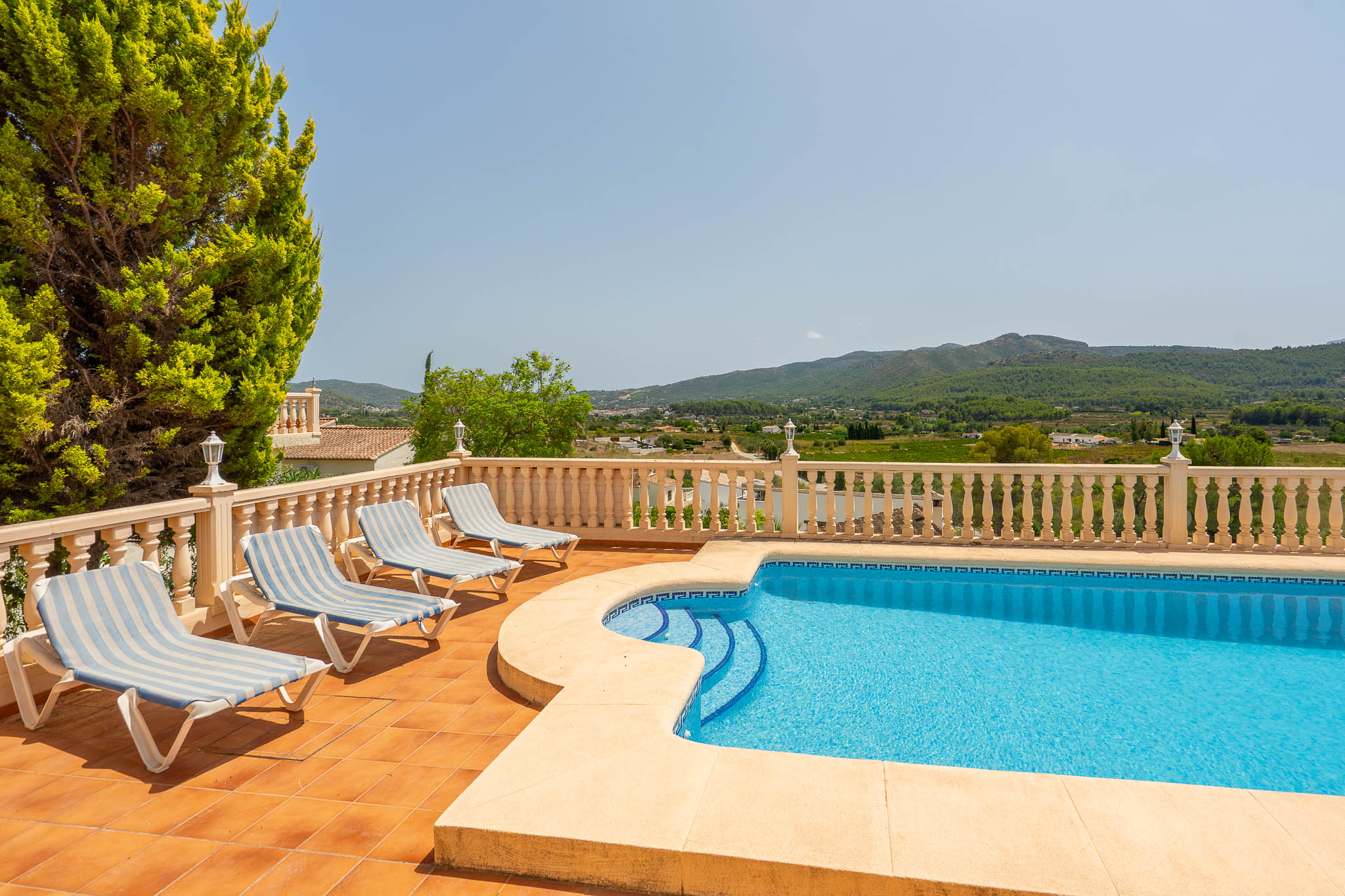 Pool terrace with mountain views