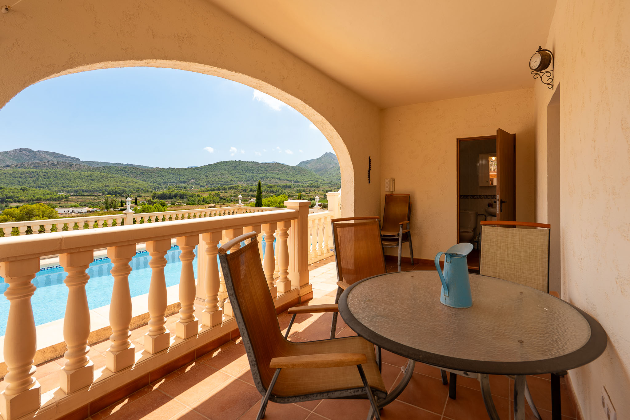 Covered terrace with mountain views