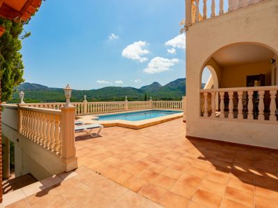 Pool terrace with mountain views