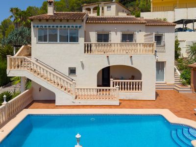 Swimming pool and villa exterior