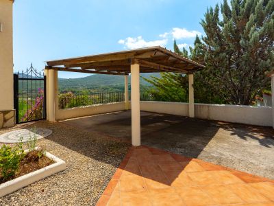 Carport with mountain views
