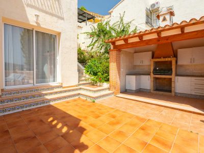 Terrace with outdoor summer kitchen