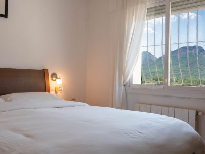 Bedroom with mountain views