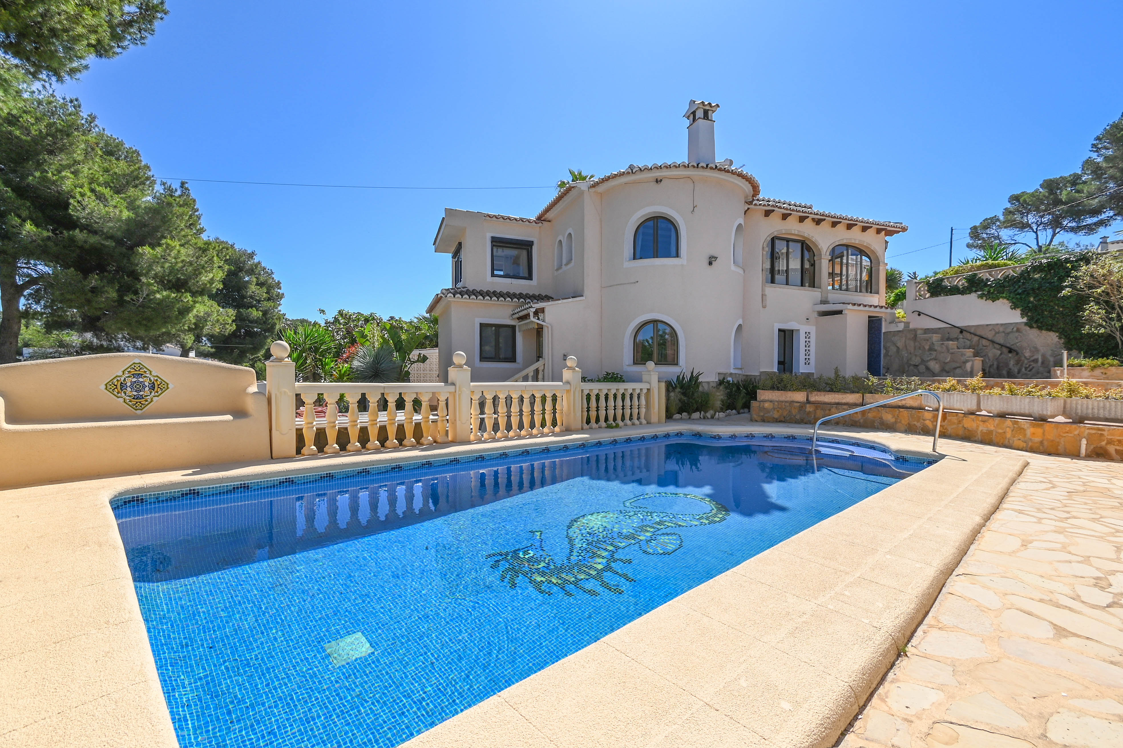 Swimming pool and villa exterior