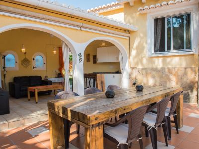 Covered terrace with summer kitchen