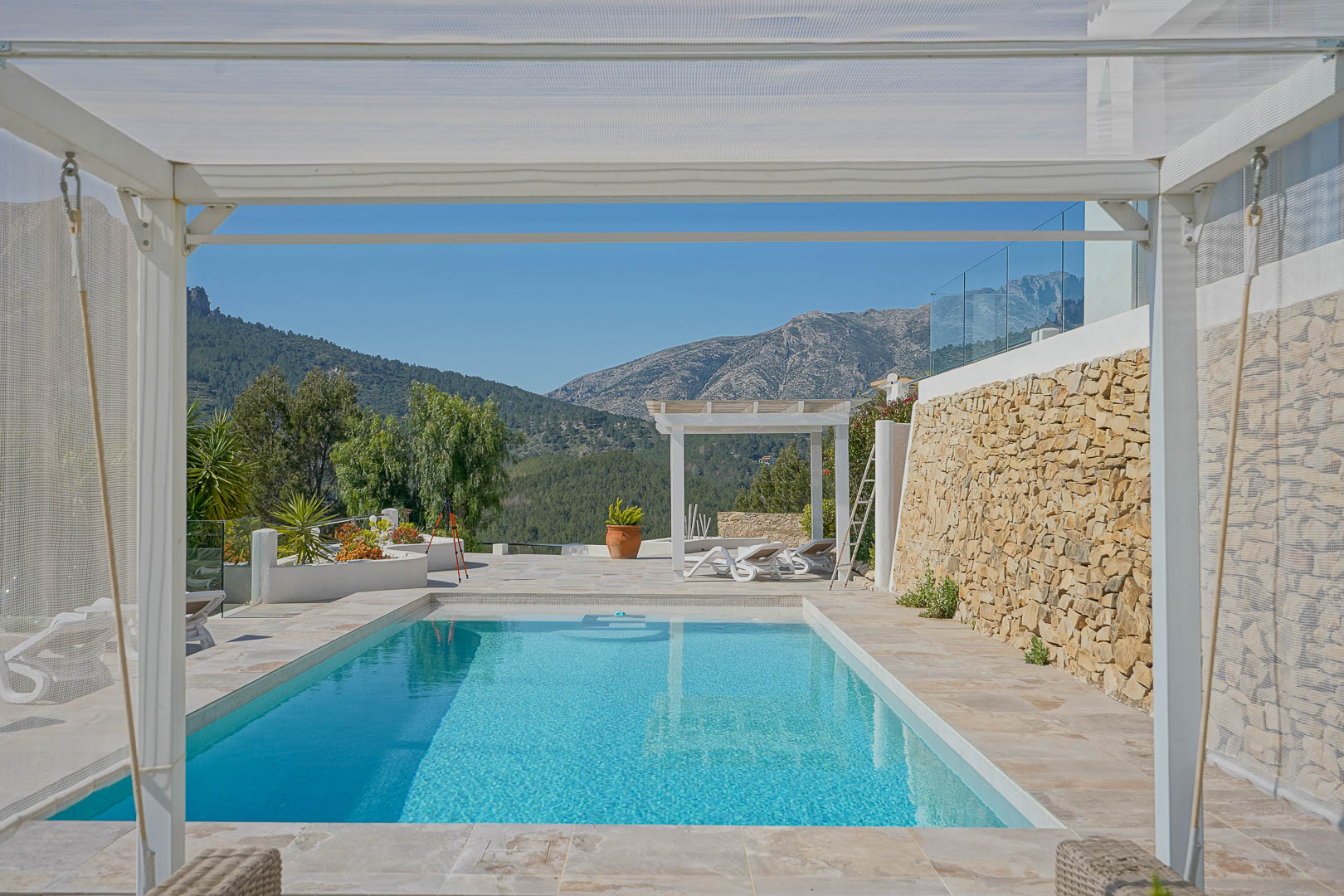 Pool terrace with mountain views