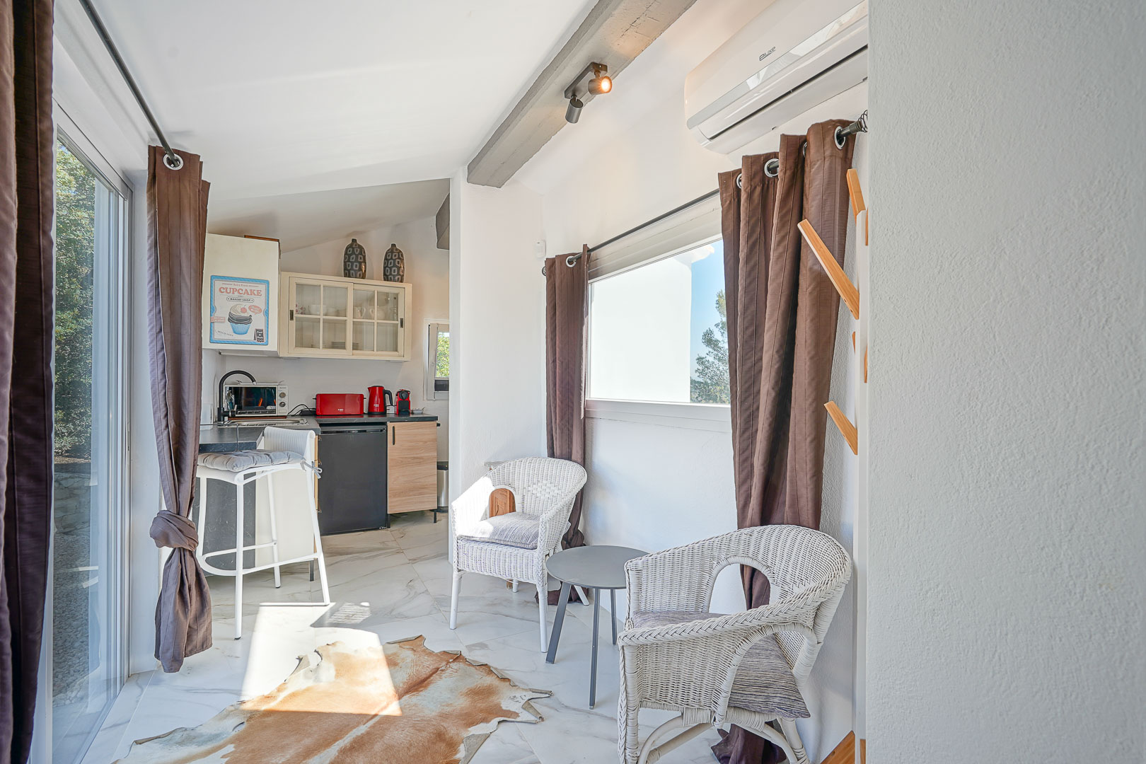 Guest house living area and kitchenette