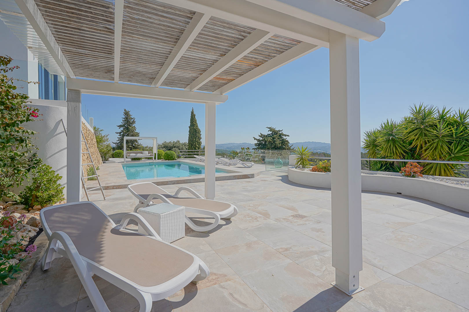 Terrace with pergola and pool