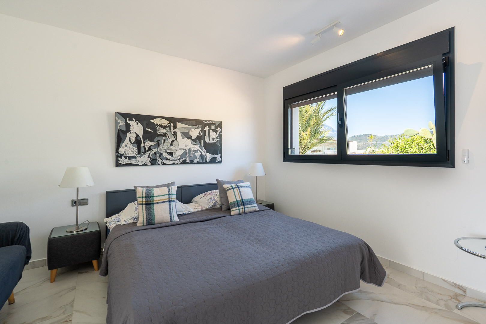 Bedroom with outdoor views