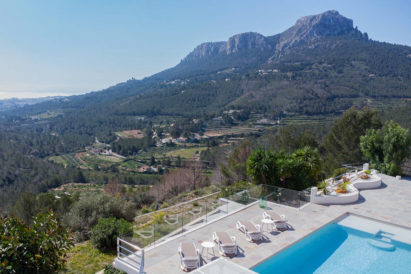 Pool terrace with mountain views